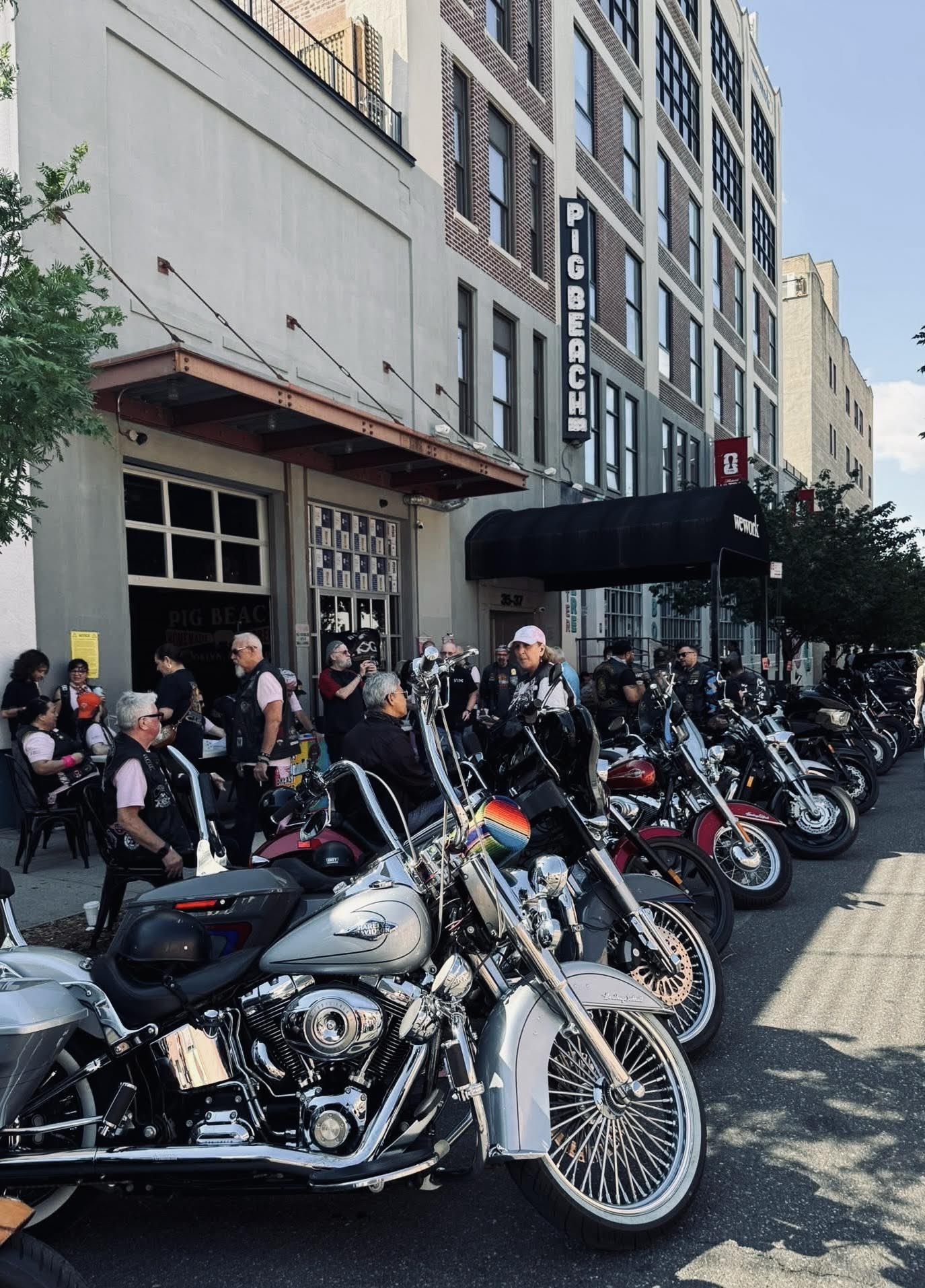 Motorcycles lined up along a street  for the 2026 Bikerrs against Breast Cancer Ride